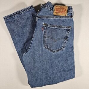 Levi's 550 Relaxed Fit Tapered Jeans Mens 34x30 Medium Wash Stonewash Indigo